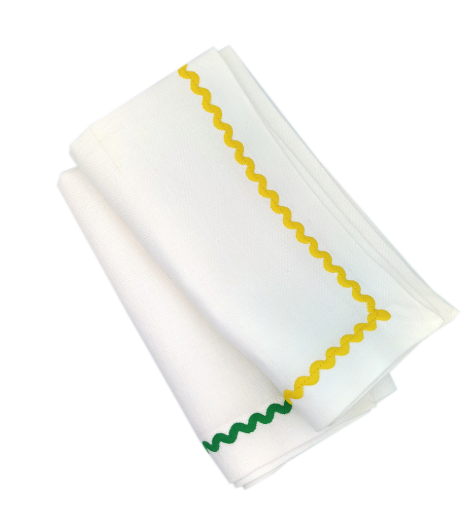 Serviette "Waldegg" aus Leinen bestickt mit gelber Borte